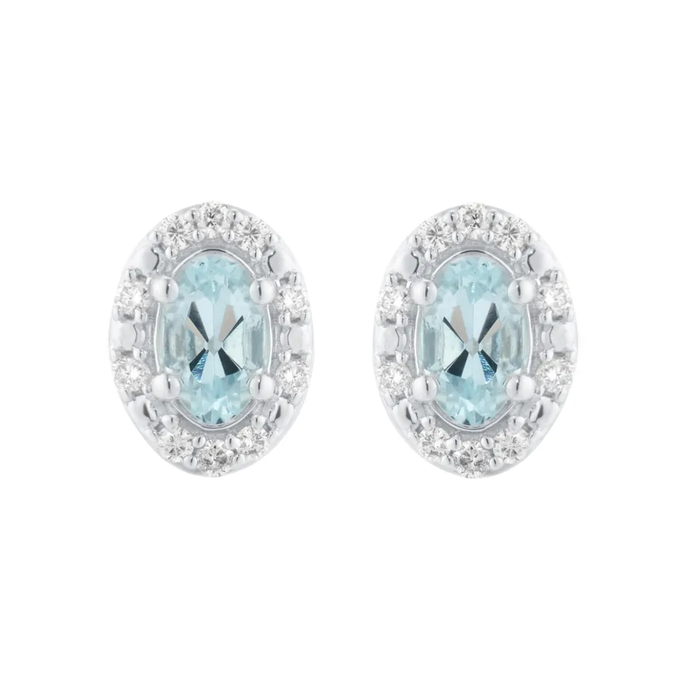 9ct White Gold Oval Aquamarine and 0.10cttw Diamond Halo Stud Earrings