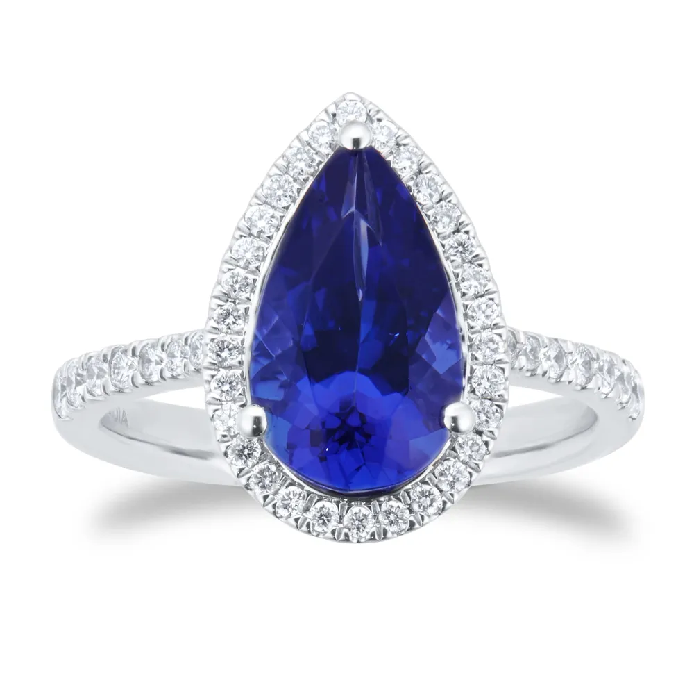 Platinum Pear Cut Tanzanite and 0.33cttw Diamond Halo Ring